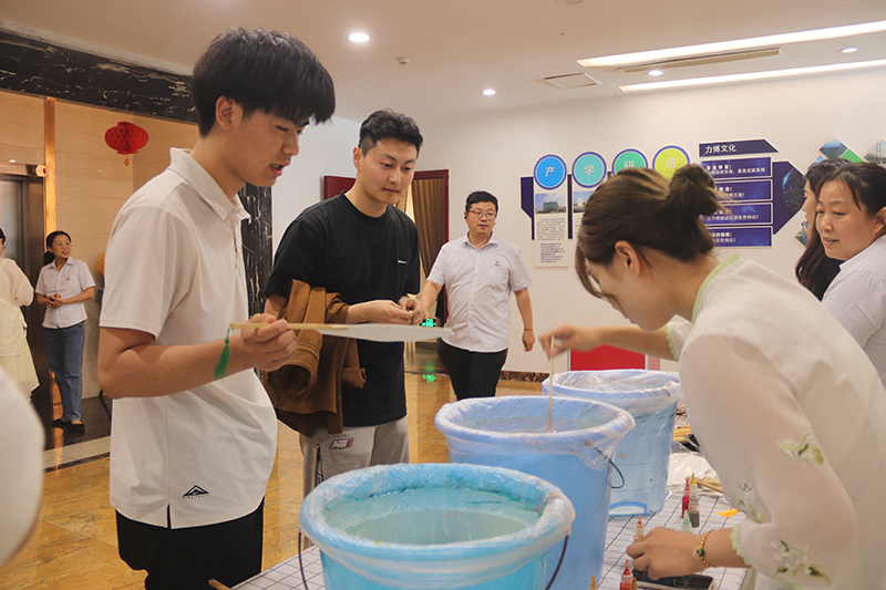 九游体育重工举办“浓情端午，趣味投壶”活动